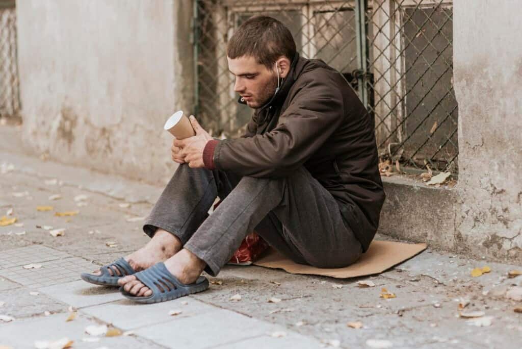 Child Trafficking In The Usa &Amp; Iowa'S Connection 2 - Homeless Man Street With Cup homeless man street with cup 2025 Jeremiah Darwin Inc