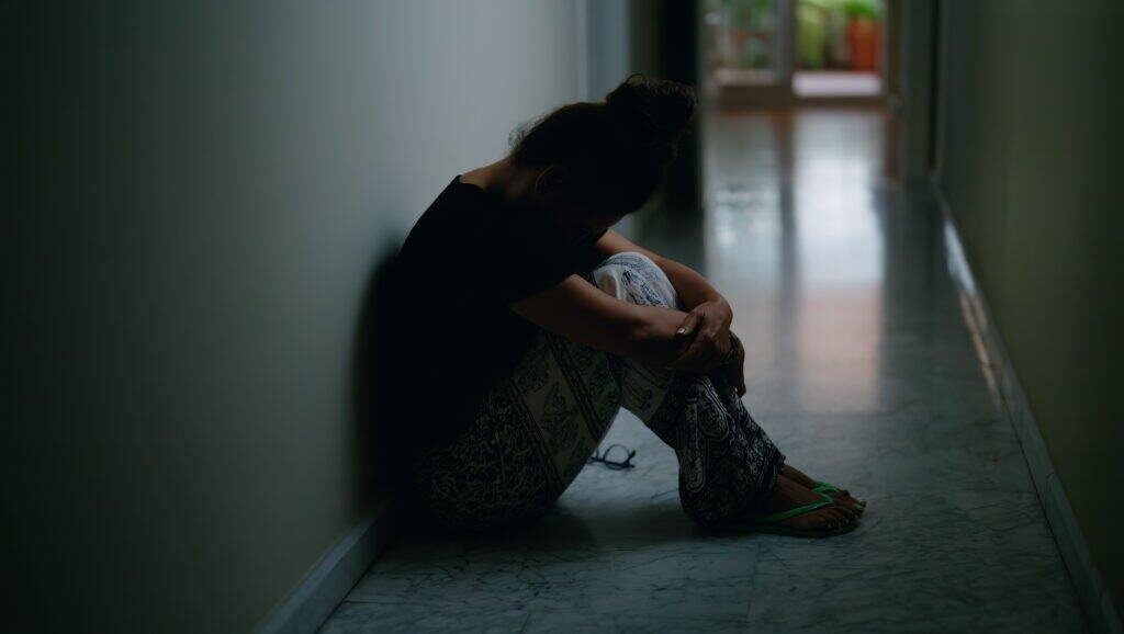 Human Trafficking In The United States: A Broader Overview 3 - Middle Age Hispanic Woman Suffering Domestic Violence With Bruise Eyes Sitting Floor Home middle age hispanic woman suffering domestic violence with bruise eyes sitting floor home 2025 Jeremiah Darwin Inc