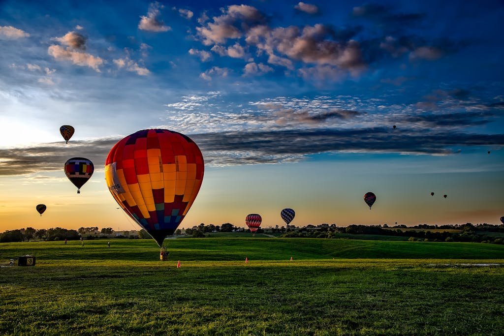 What Is Child Trafficking? A Clear Definition For Iowans 4 - Vibrant Hot Air Balloons Take Off At Dawn Over A Rural Field Showcasing A Picturesque Landscape. 210012 Vibrant hot air balloons take off at dawn over a rural field, showcasing a picturesque landscape.